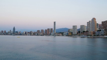 Wall Mural - Sunrise over  Benidorm beach resort, Spain, a time lapse