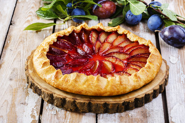 plum cake on a wooden surface