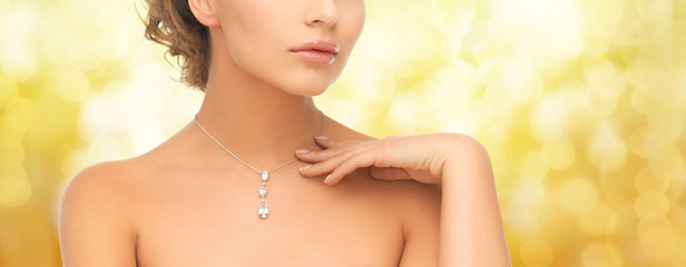 Poster - woman wearing shiny diamond pendant