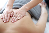Fototapeta  - Close up of back massage procedure in spa salon
