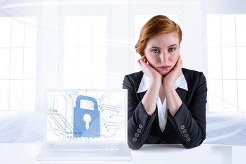 Poster - Composite image of redhead businesswoman looking unhappy