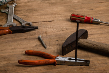 old tools on wooden background