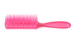 Pink hairbrush isolated on white background.