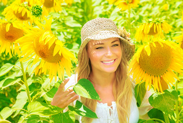 Poster - Cute girl in sunflower field