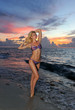 © FashionStock - Model posing in bikini at early morning sunrise