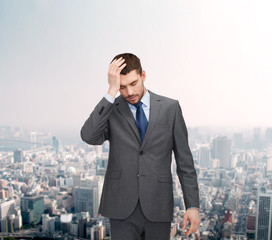 Poster - handsome businessman having headache