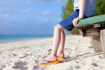 Canvas Print - boy's feet at the beach