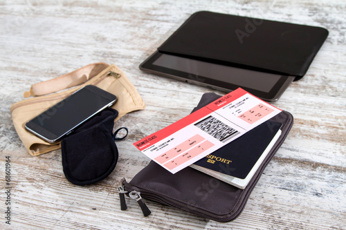 Fotografie, Obraz Airline ticket, passport and electronics