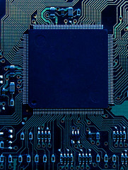 blue circuit board background of computer motherboard