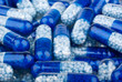Blue capsules (pills) background