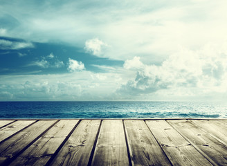 tropical beach and wooden platform