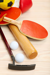 Poster - Sports equipment on wooden background