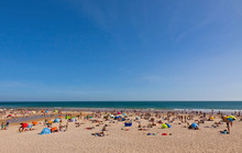 Crowded Atlantic Summer Beach In Portugal