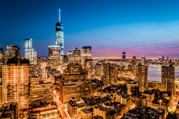 Wall Mural - Aerial view over the New York Financial District at dusk.