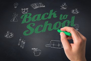 Poster - Composite image of hand holding blue chalk