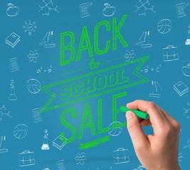 Poster - Composite image of hand holding blue chalk