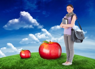 Poster - Composite image of student holding books