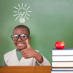 Poster - Composite image of cute pupil showing thumbs up