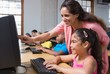 © WavebreakmediaMicro - Cute pupils in computer class with teacher