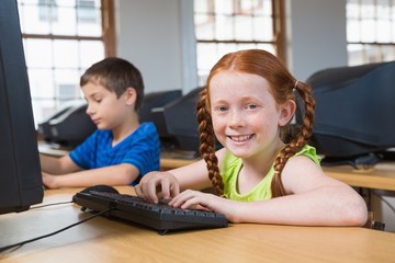 Wall Mural - Cute pupils in computer class