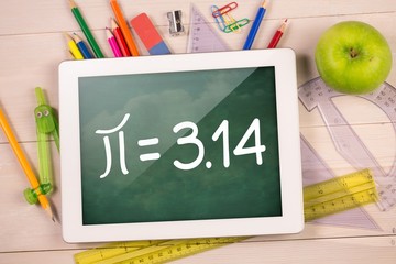 Poster - Composite image of digital tablet on students desk