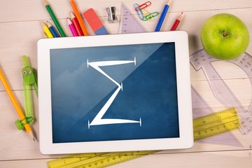 Poster - Composite image of digital tablet on students desk