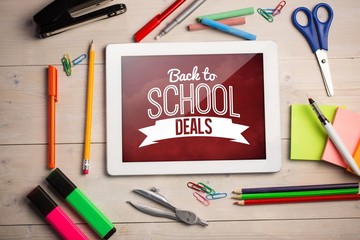 Poster - Composite image of digital tablet on students desk