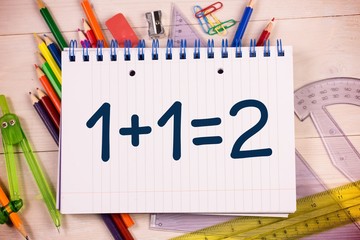 Poster - Composite image of one plus one equals two on notepad