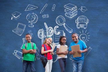 Wall Mural - Composite image of cute pupils smiling at camera