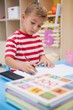 © WavebreakMediaMicro - Cute little boy drawing at desk