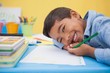 © WavebreakMediaMicro - Cute little boy drawing at desk