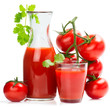 Bottle and glass of tomato juice and ripe tomatoes.