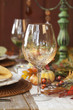 Fall dining table with focus on wine glass