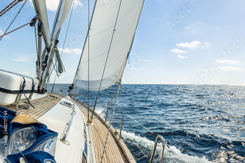 Fototapeta na wymiar Yacht sail in the Atlantic ocean at sunny day cruise