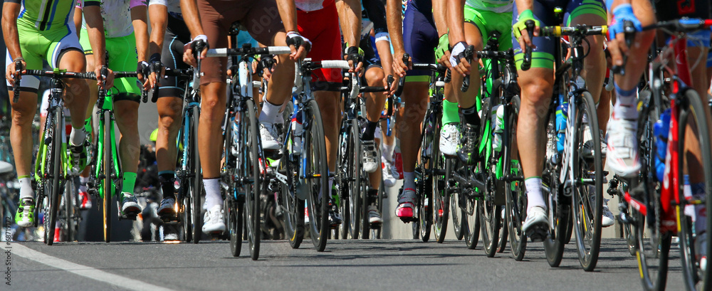 cyclists ride  during the international race - obrazy, fototapety, plakaty 