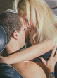 © M-Production - Young couple making love in the car.