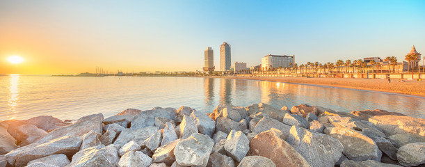 Wall Mural - barceloneta beach in barcelona at sunrise