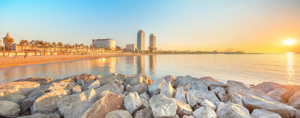 Wall Mural - barceloneta beach in barcelona at sunrise