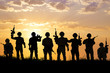 © Tom Wang - silhouette of  Soldiers team with sunrise background