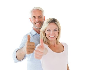 Aufkleber - Smiling couple showing thumbs up together