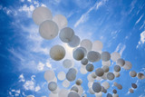 Fototapeta Na sufit - White balloons on the blue sky