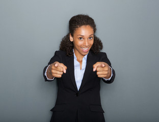 Wall Mural - Confident business woman pointing finger