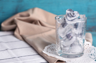 Wall Mural - Ice cubes with raspberry and blueberry in glasses,