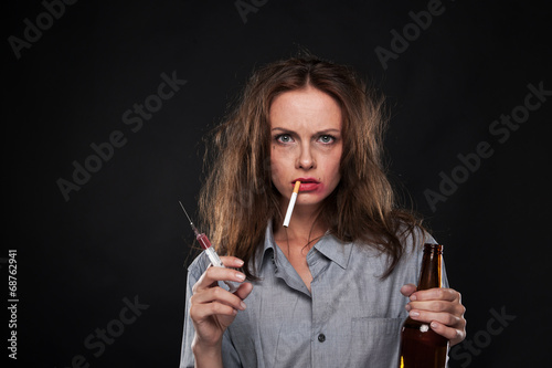 Portrait Of Woman Smoking Cigarette Hanging Out Of Her Mouth Buy