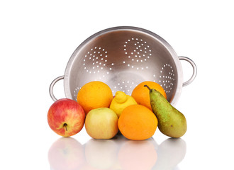 Wall Mural - Metal colander full of juicy fruits.