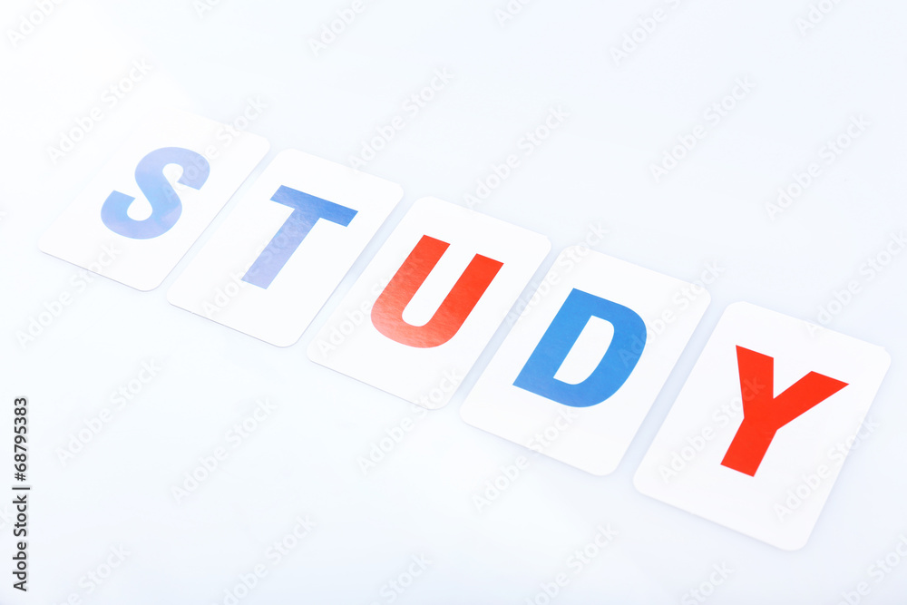Study word formed by educational paper cards isolated on white