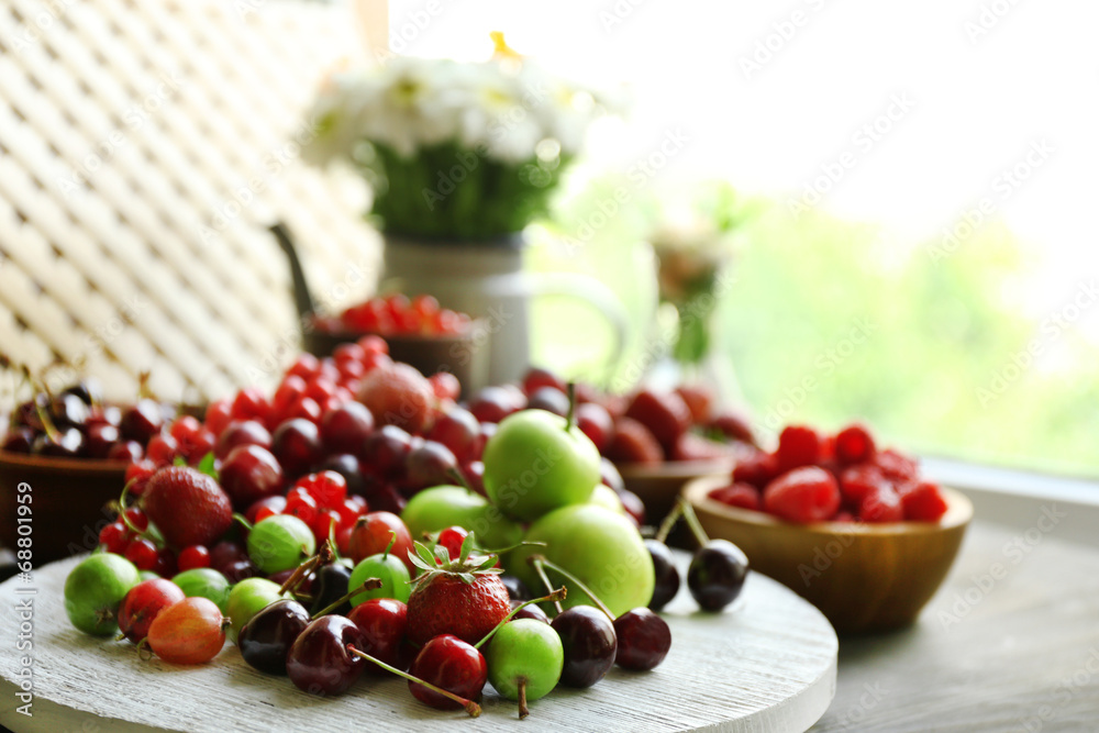 Still life with berries and flowers
