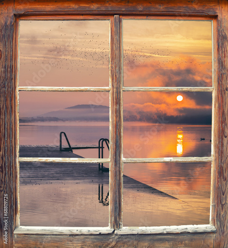 Naklejka na drzwi Fensterblick Sonnenaufgang