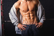 © BigLike Images - Young bodybuilder man with abs in gym