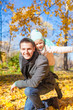 © travnikovstudio - Portrait of happy father with his cute daughter in autumn park